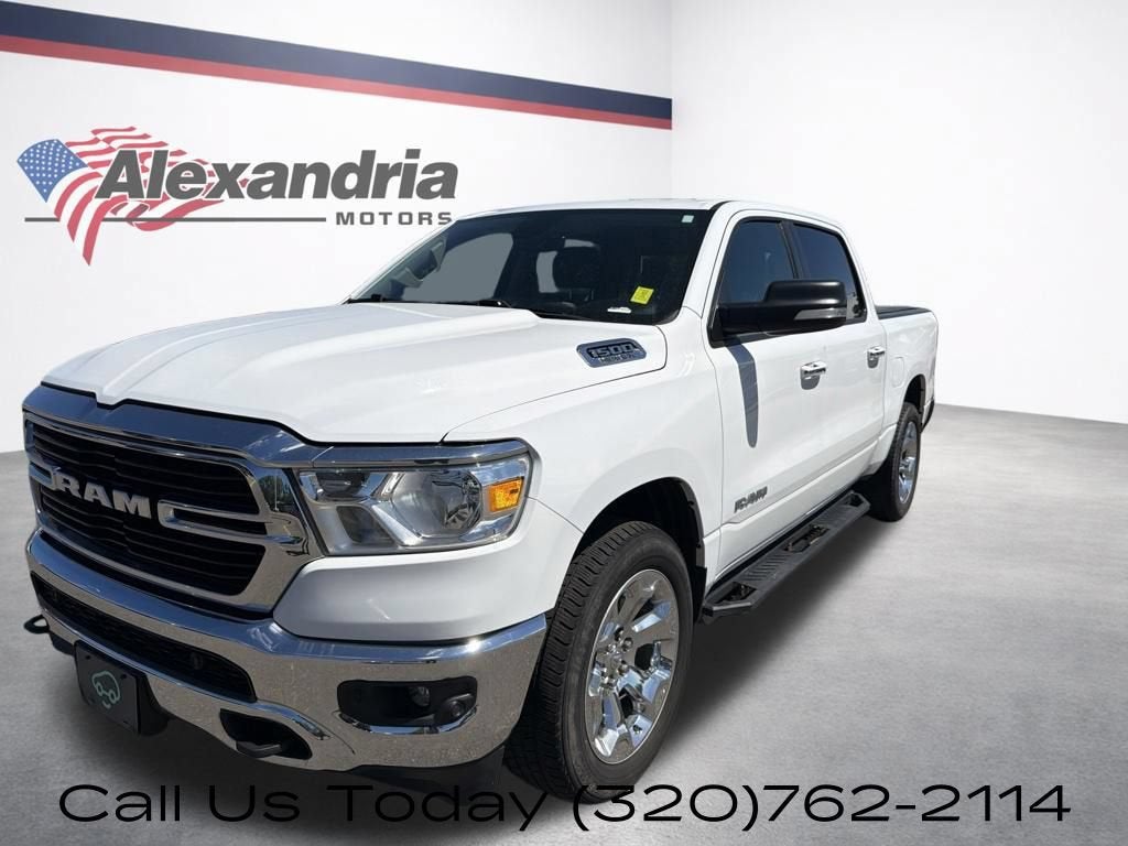 2020 RAM 1500 Big Horn Crew Cab 4x4 5'7" Box in White — front three-quarter view