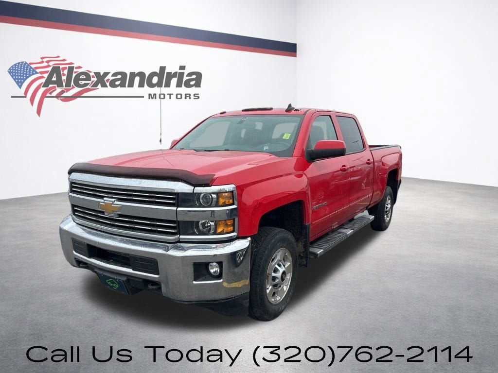 2016 Chevrolet Silverado 2500 HD LT in Red Hot — front three-quarter view