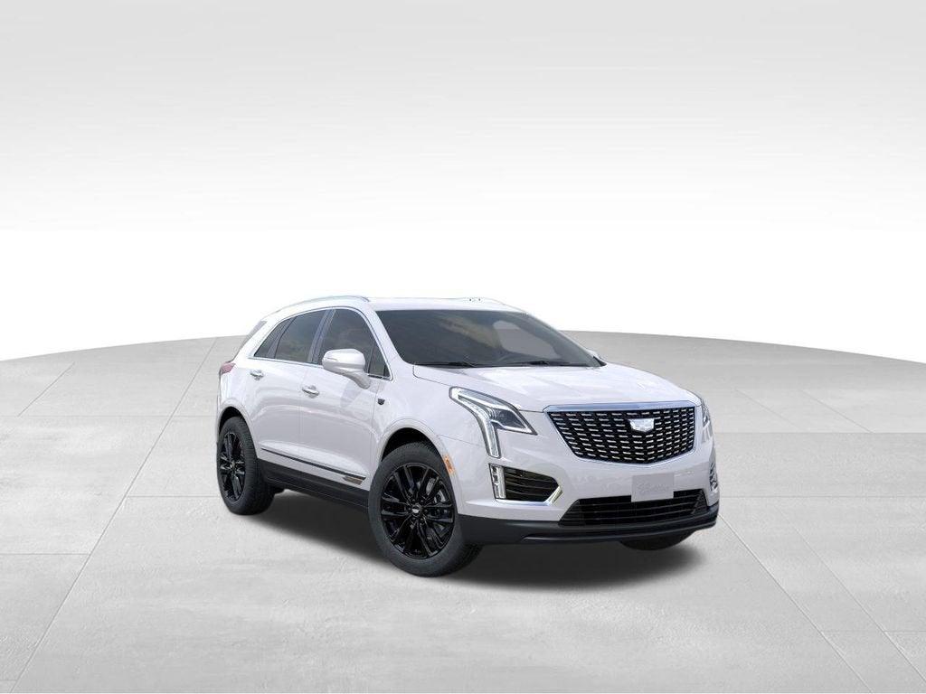 2026 Cadillac XT5 Luxury in Crystal White Tricoat — front three-quarter view