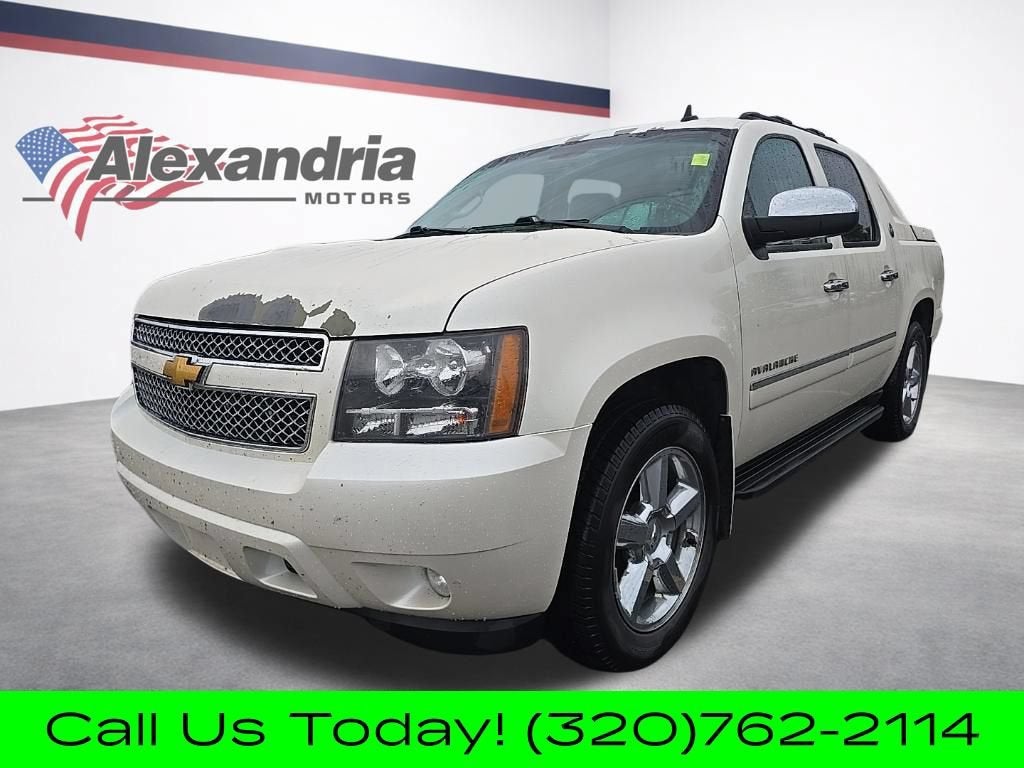 2013 Chevrolet Avalanche LTZ in White Diamond Tricoat — front three-quarter view