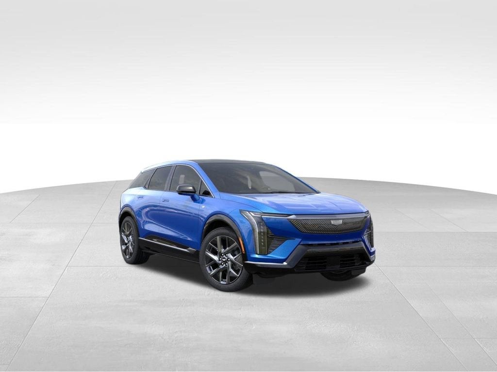 2026 Cadillac OPTIQ Luxury in Coastal Blue Metallic — front three-quarter view